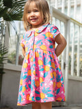 Robe Frugi Baby en coton bio Lettie, couleur fleur d'oranger