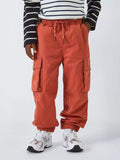 Pantalon parachute pour enfant John Lewis, orange